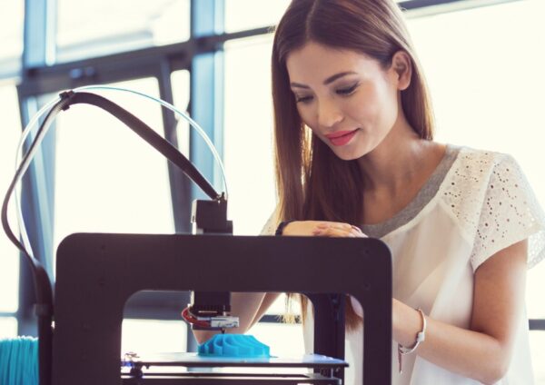 young-asian-woman-using-a-3d-printer-watching-at-3d-printout_medium-2048x1364-1